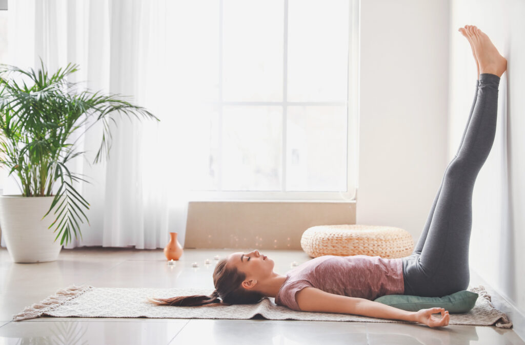 woman stretching trying to relieve symptoms of SAD