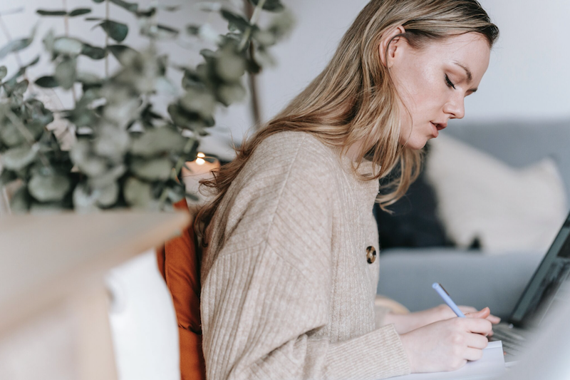 Young woman journaling