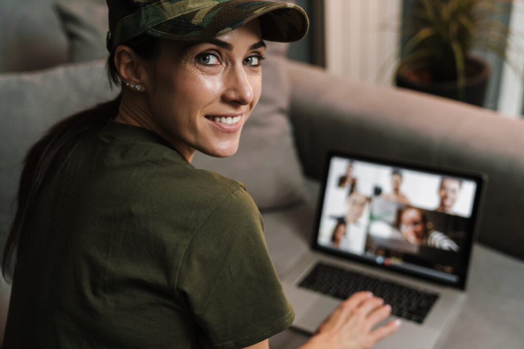 military woman attending online support meeting for remembrance day