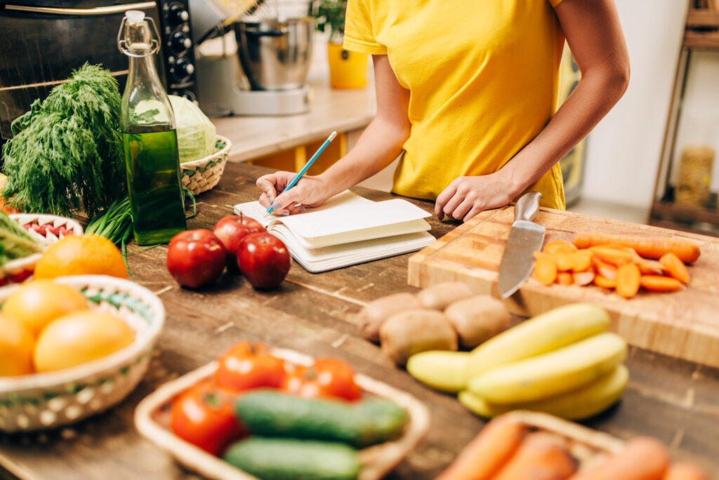 woman keeping track of nutrition and cooking