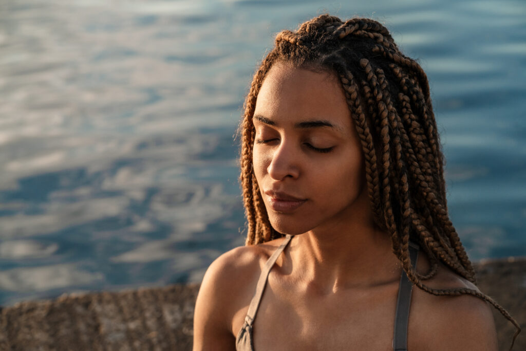 woman practicing radical acceptance through meditation