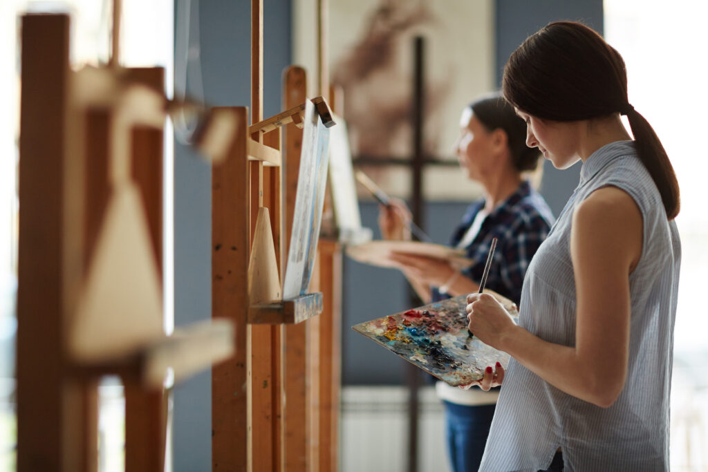 woman trying new hobby painting