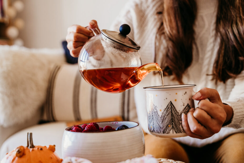 woman pouring tea