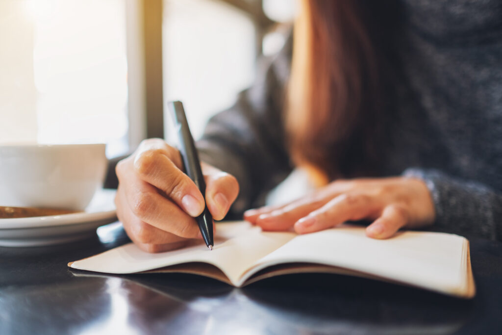 woman journaling about change