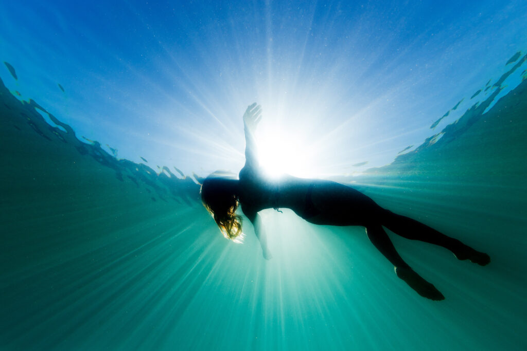 woman floating and relaxing in water